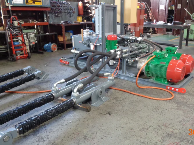 Headgear bin discharge hydraulic power packs & cylinders